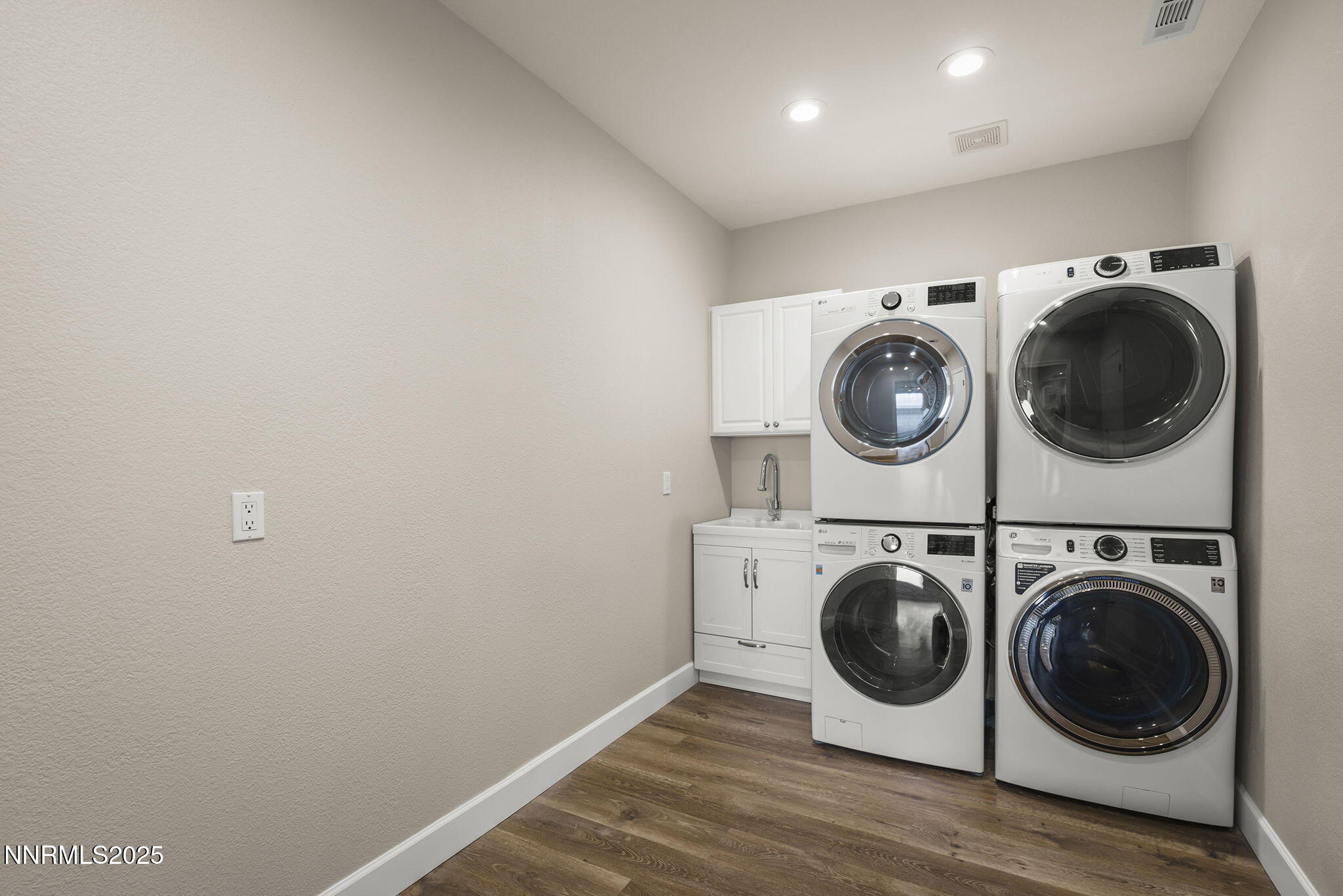 5640 Rue St Tropez Reno, NV 89511 - Photo 38 of 55 a view of kitchen with washer and dryer