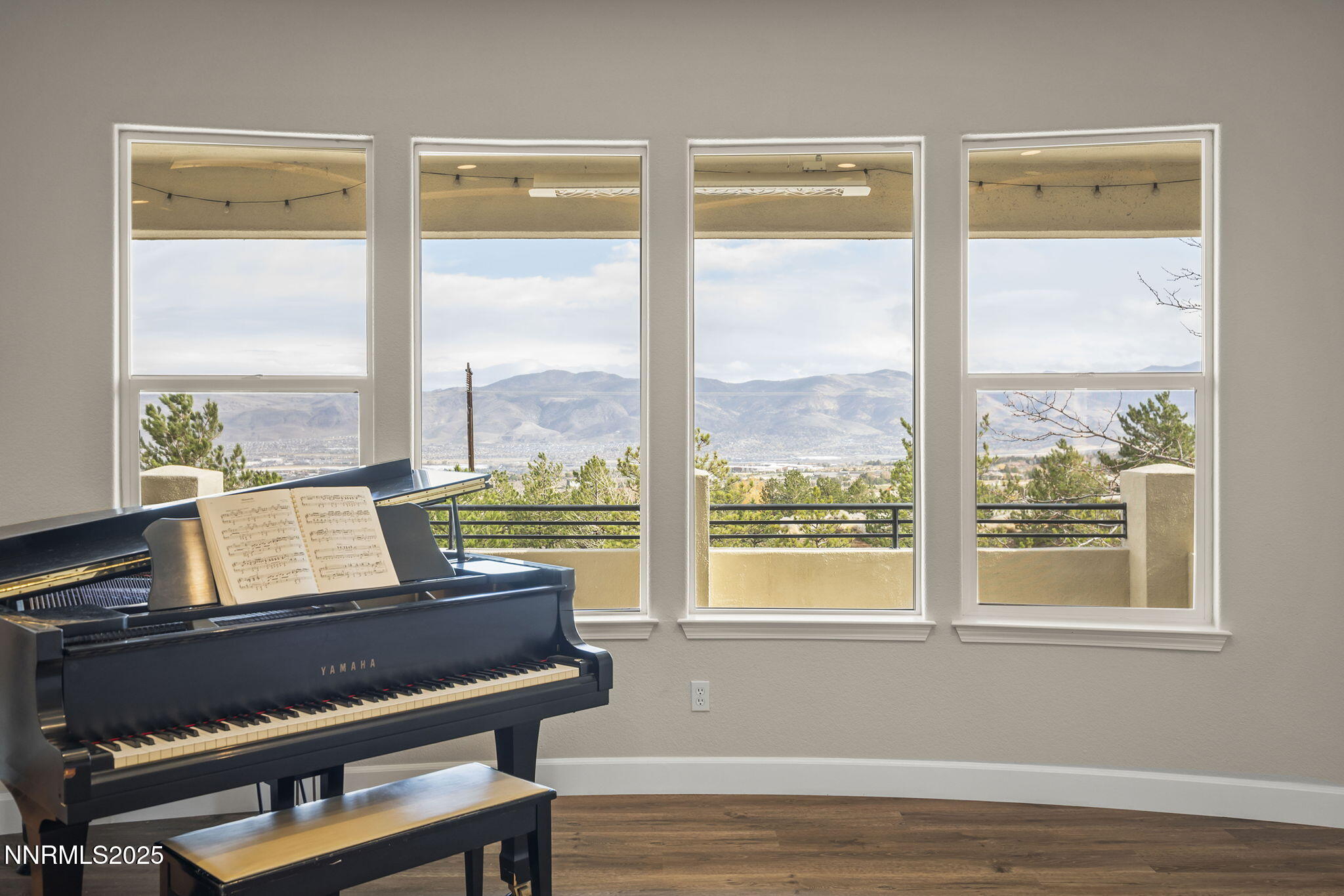 5640 Rue St Tropez Reno, NV 89511 - Photo 4 of 55 a view of a room with wooden floor