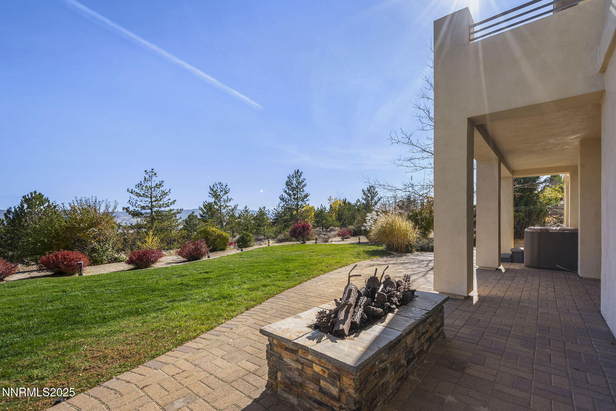 5640 Rue St Tropez Reno, NV 89511 - Photo 42 of 55 a view of a white couches and a table and chairs in backyard