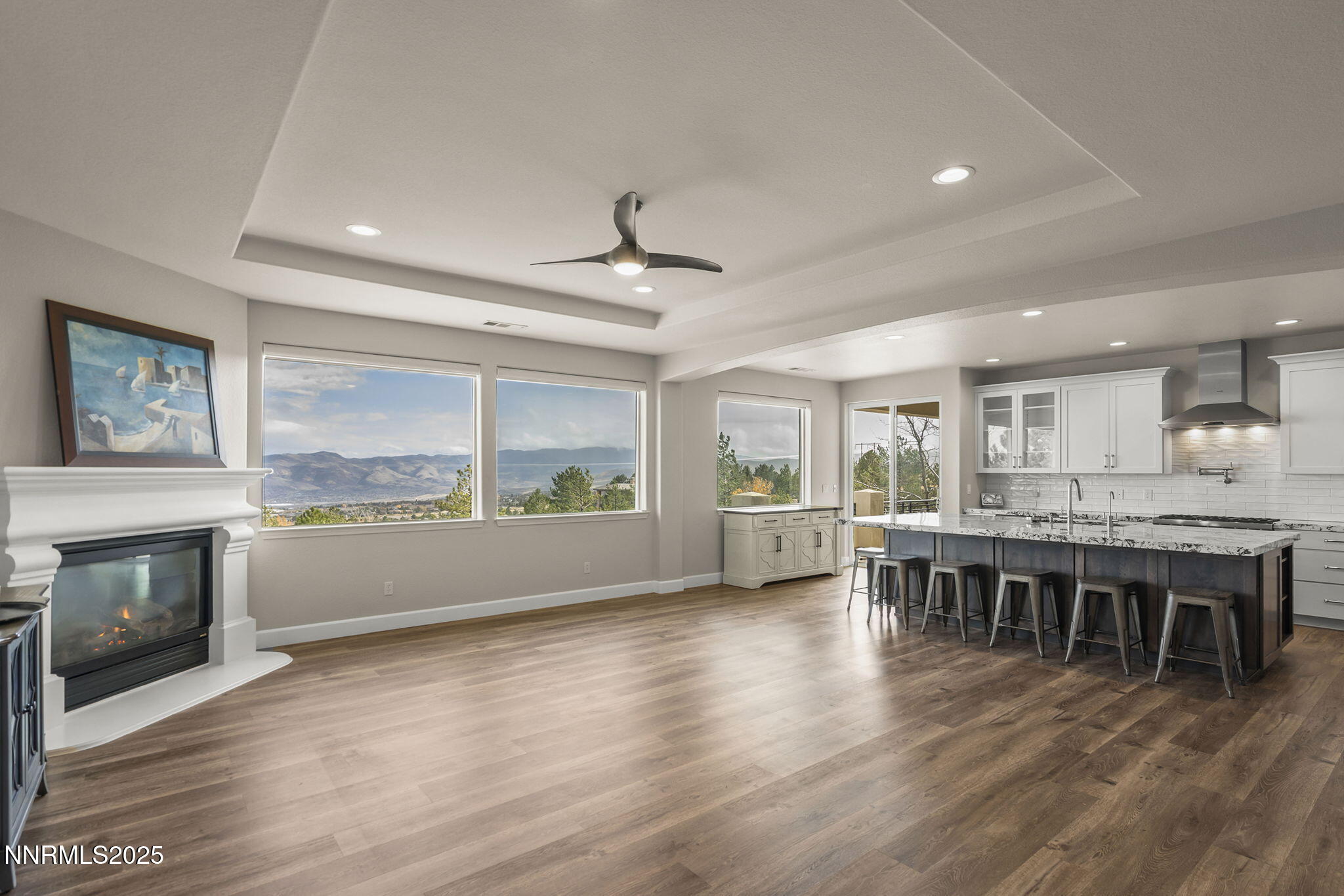 5640 Rue St Tropez Reno, NV 89511 - Photo 6 of 55 a large kitchen with a table and chairs