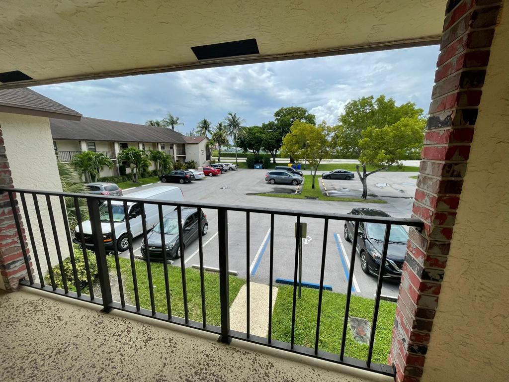 23466 Lyons Road, Unit 509 Boca Raton, FL 33428 - Photo 8 of 17 a view of a balcony