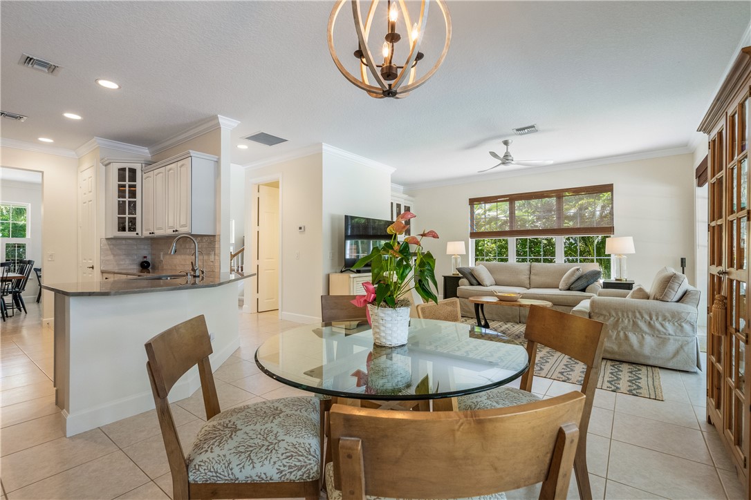 886 Carolina Circle Southwest Vero Beach, FL 32962 - Photo 13 of 36 a dining room with furniture a window and a view