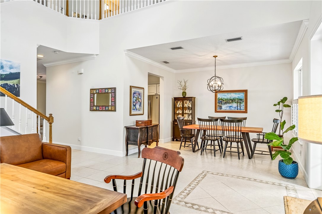 886 Carolina Circle Southwest Vero Beach, FL 32962 - Photo 17 of 36 a living room with furniture and wooden floor