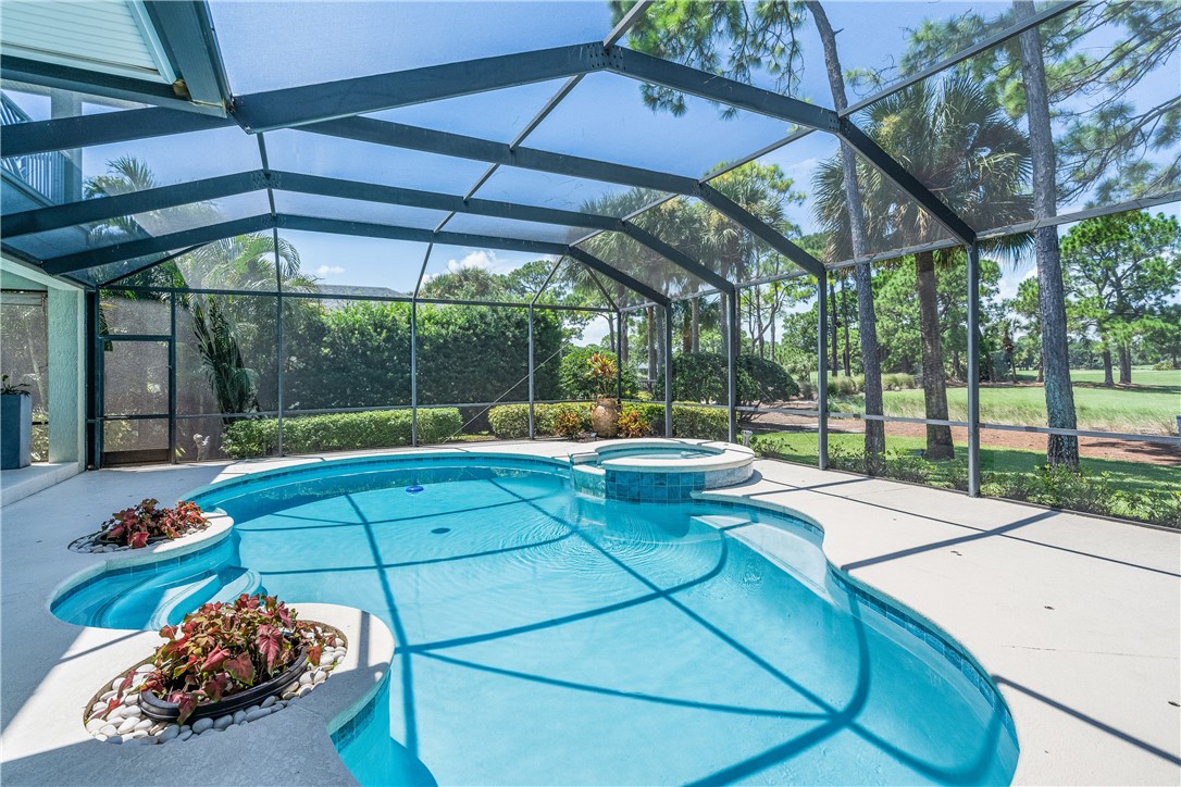 886 Carolina Circle Southwest Vero Beach, FL 32962 - Photo 3 of 36 a view of a backyard with sitting area