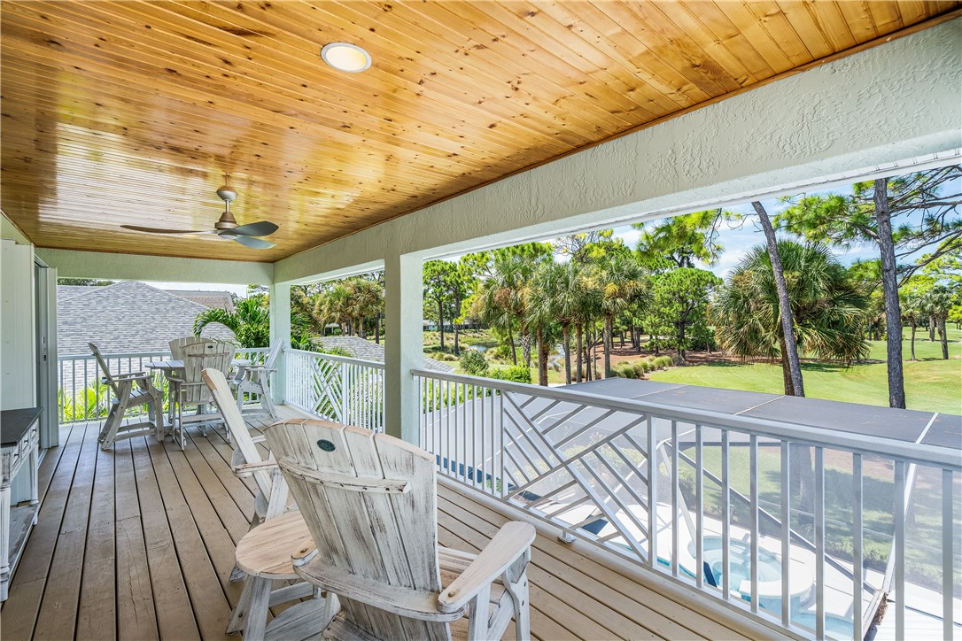 886 Carolina Circle Southwest Vero Beach, FL 32962 - Photo 4 of 36 a view of a two chair in the balcony