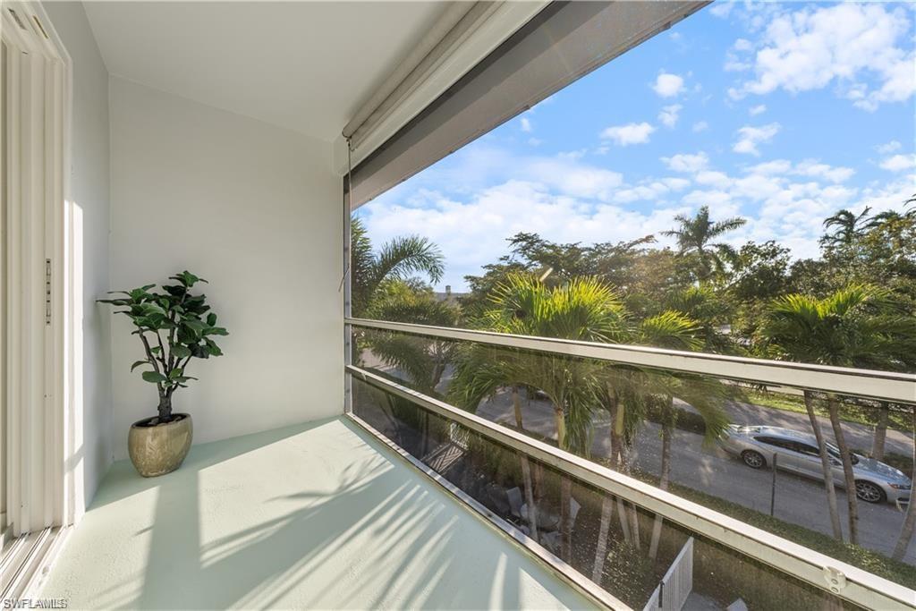 72 7th Street South, Unit 310 Naples, FL 34102 - Photo 14 of 24 a view of balcony with furniture