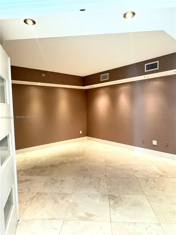 a view of a room with an empty space