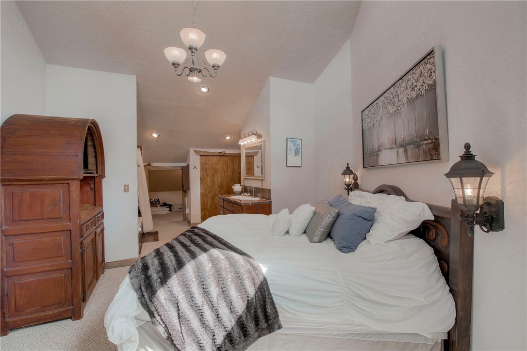9460 Ryan Gulch Road, Unit 60 Silverthorne, CO 80498 - Photo 13 of 34 Master bedroom