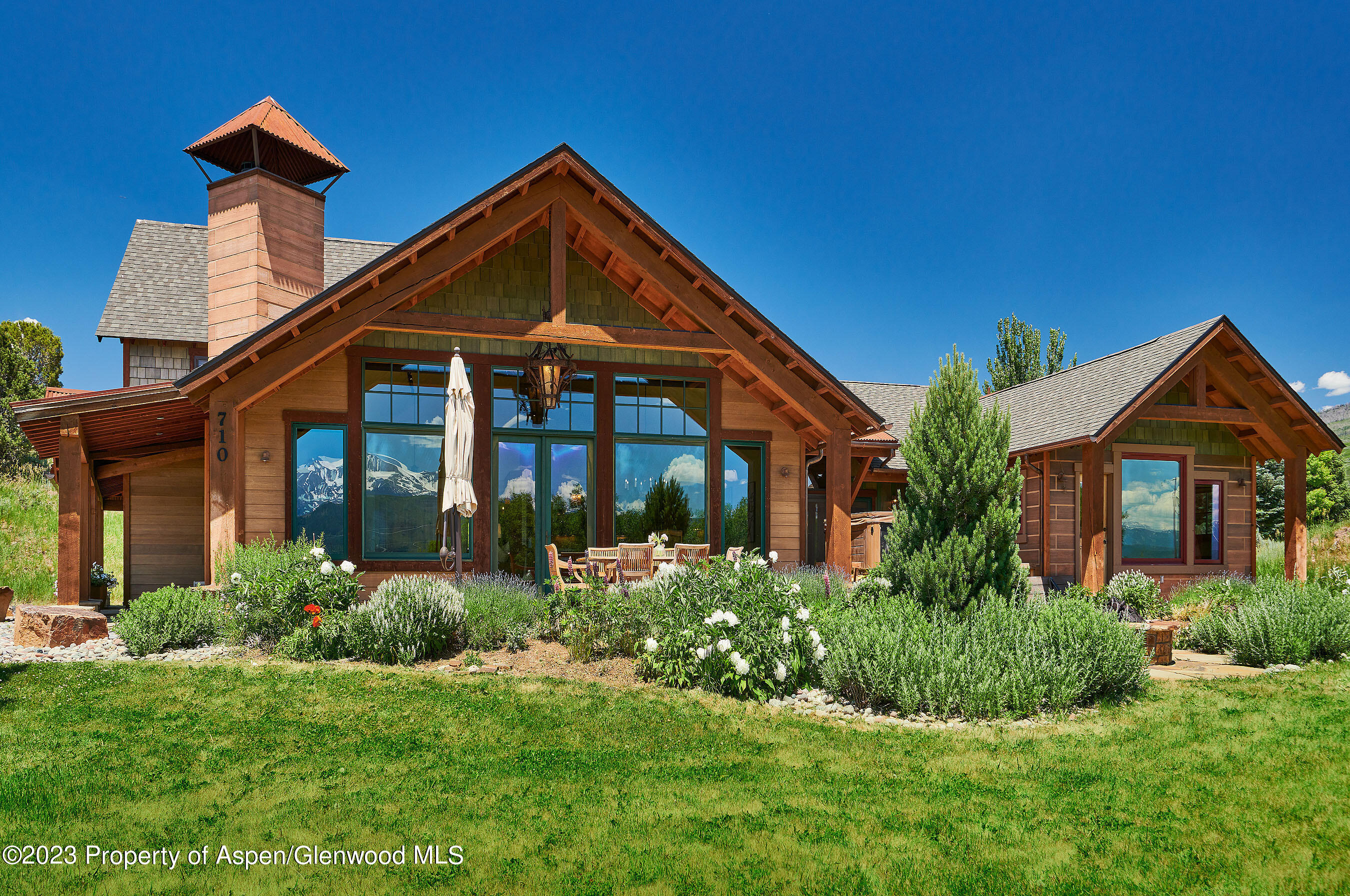 710 Paseo Drive Carbondale, CO 81623 - Photo 1 of 1 a front view of a house with a yard