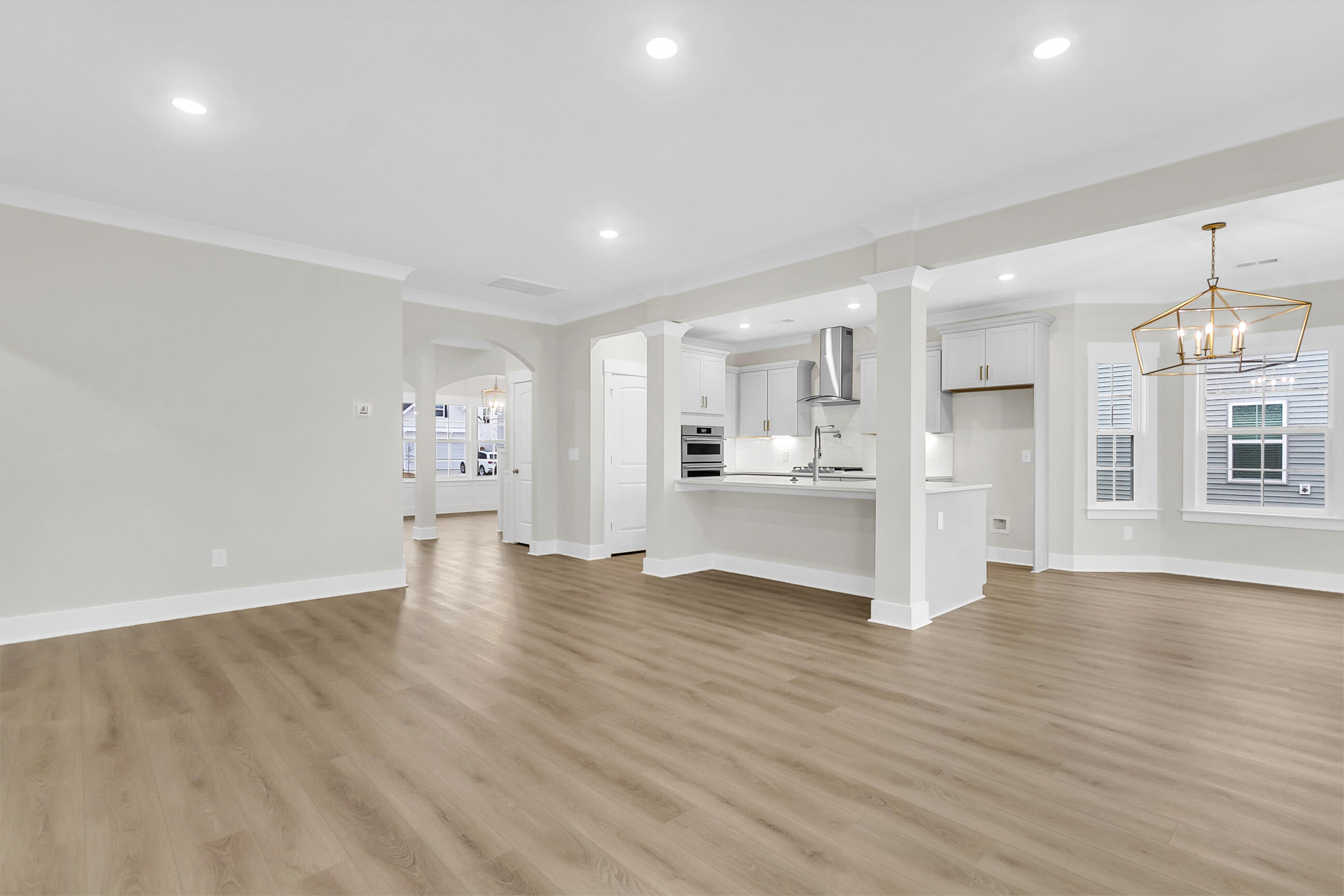 462 Rowley Lane Summerville, SC 29486 - Photo 11 of 92 Family Room to Kitchen and Eat-In