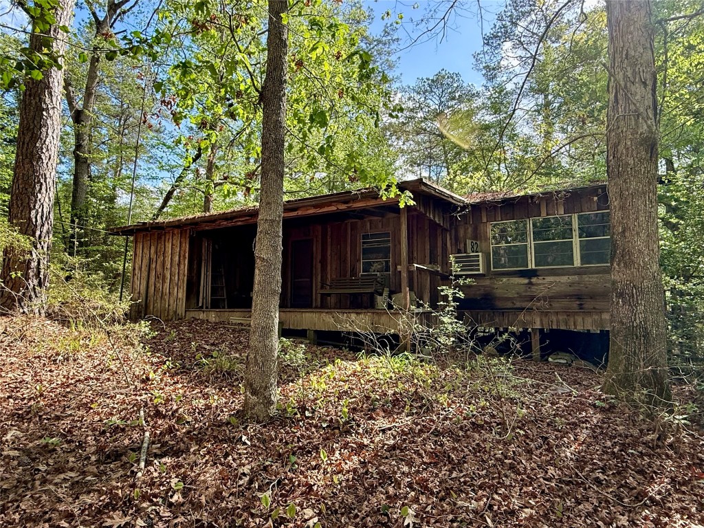 526 Mt Pisgah Road Woodville, TX 75979 - Photo 19 of 23 a house view with a backyard space