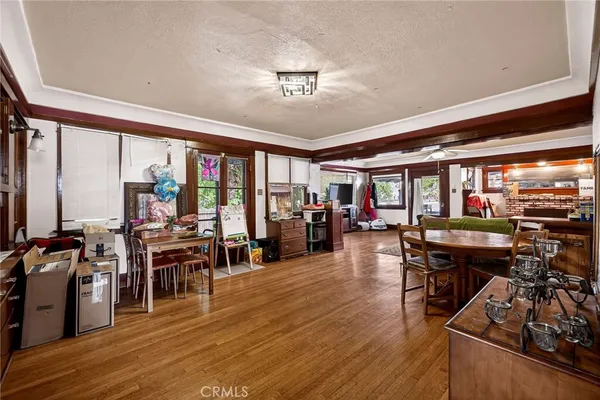a living room with lots of furniture and a flat screen tv