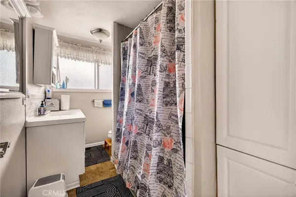 a view of a room with washer and dryer