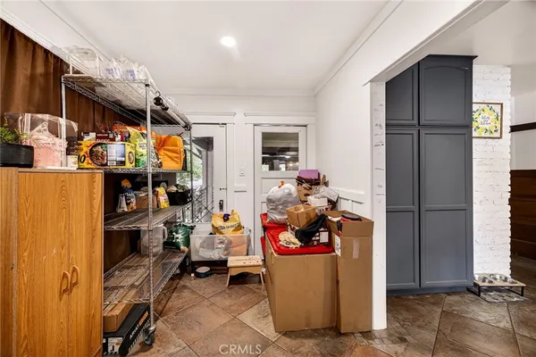 a house view with swimming pool in front of it