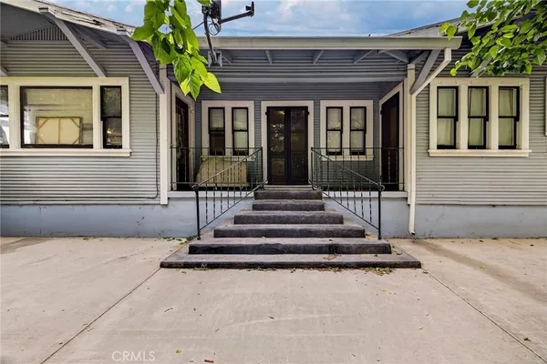 an aerial view of residential building and lake