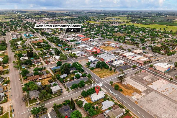 a view of a city with an ocean view