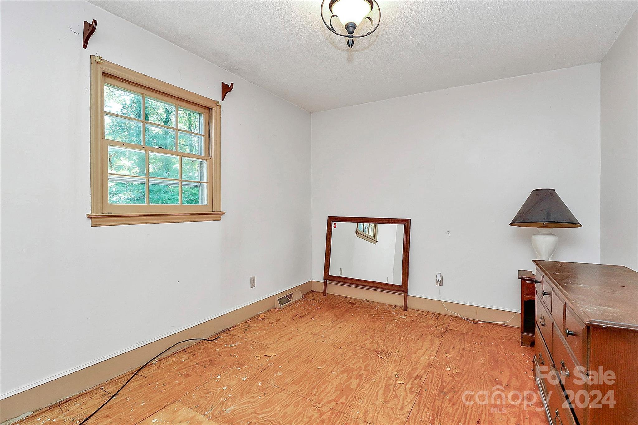 9811 Hannon Road Mint Hill, NC 28227 - Photo 16 of 27 a view of room window and wooden floor