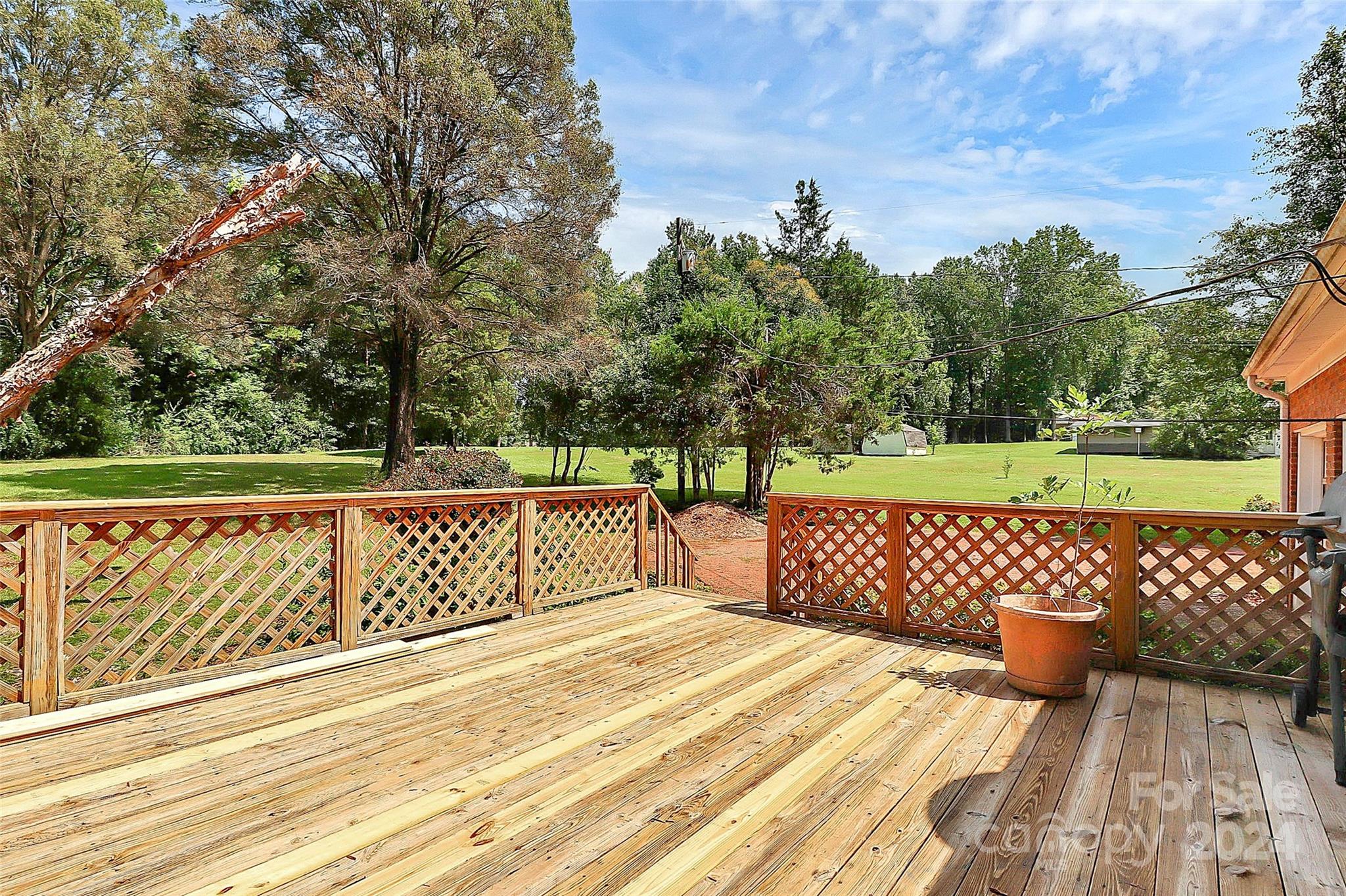 9811 Hannon Road Mint Hill, NC 28227 - Photo 6 of 27 a view of outdoor space with deck and a bench