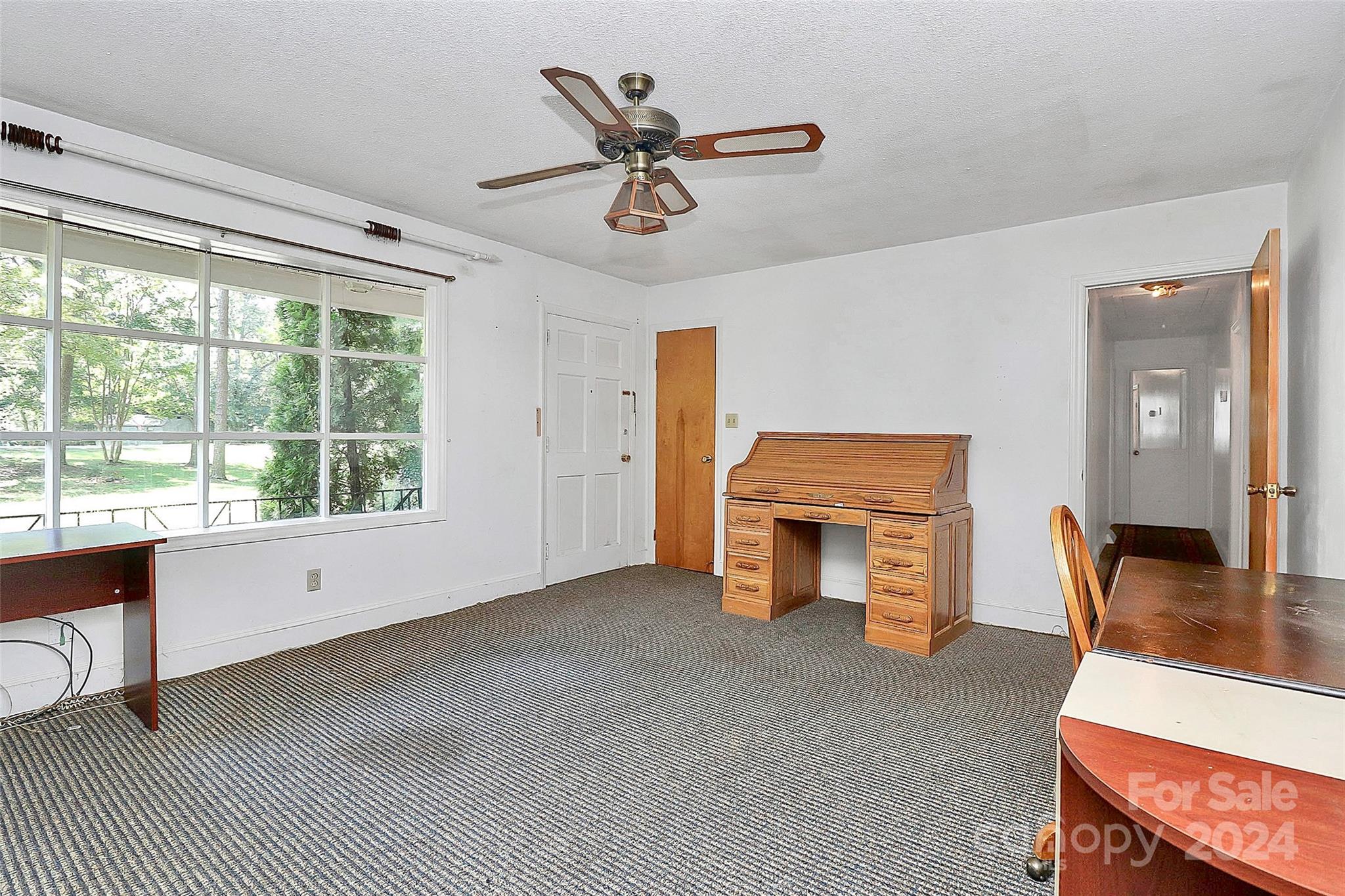 9811 Hannon Road Mint Hill, NC 28227 - Photo 7 of 27 a living room with furniture and a fireplace