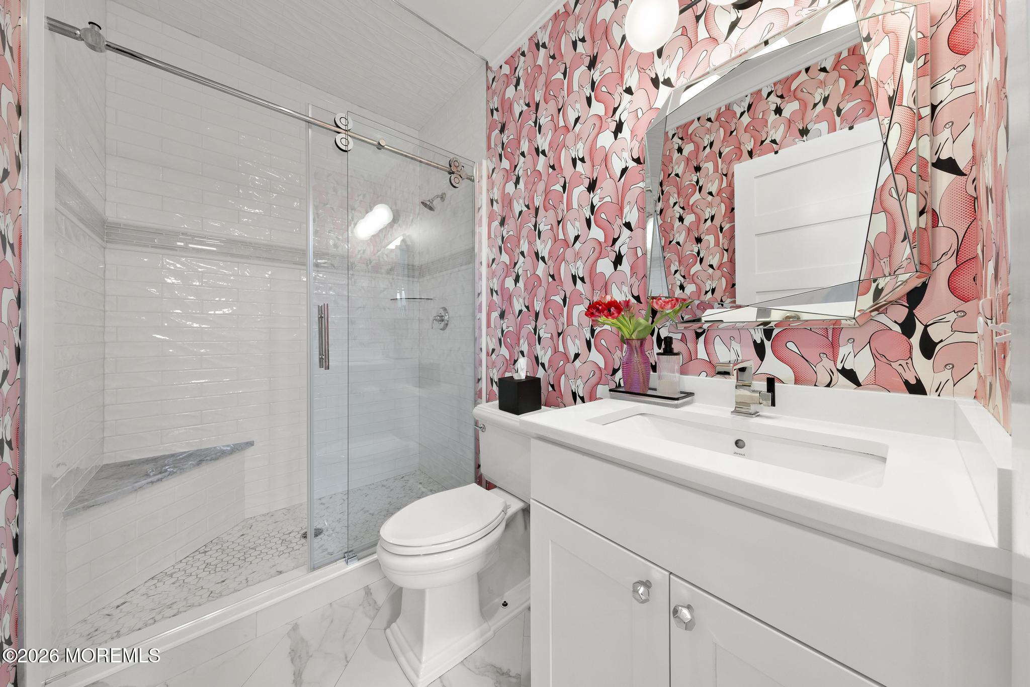 90 Washington Street Rumson, NJ 07760 - Photo 12 of 31 a bathroom with a sink toilet and shower