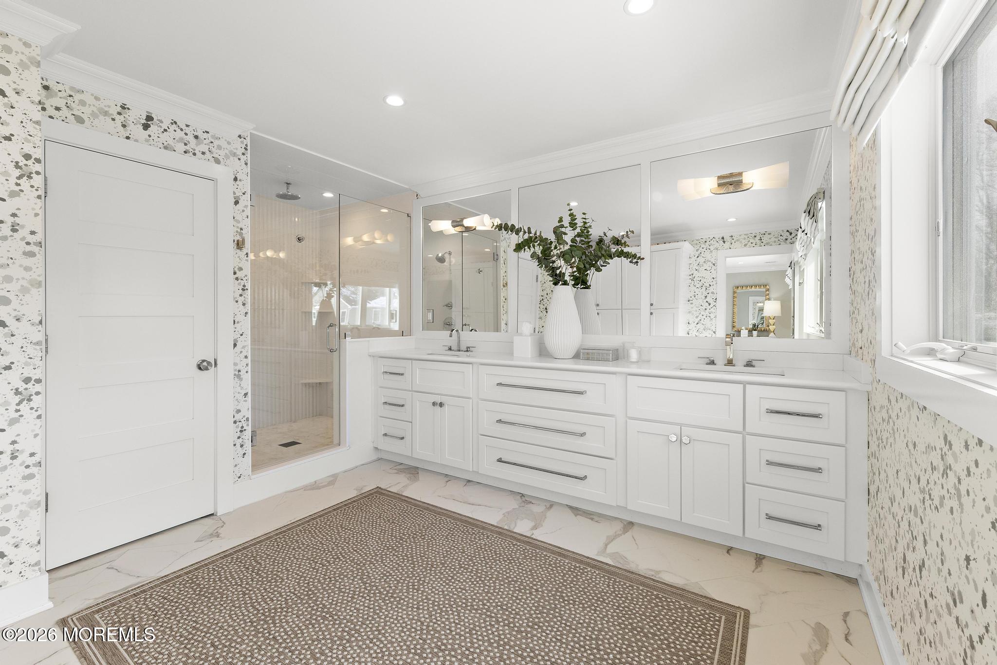 90 Washington Street Rumson, NJ 07760 - Photo 13 of 31 a bathroom with a double vanity sink mirror and shower