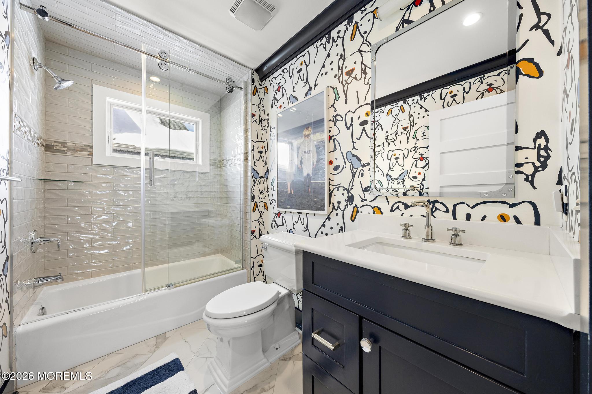 90 Washington Street Rumson, NJ 07760 - Photo 8 of 31 a bathroom with a sink a toilet and a bathtub