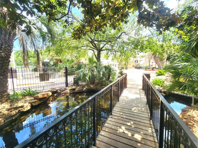 a view of a swimming pool with a house