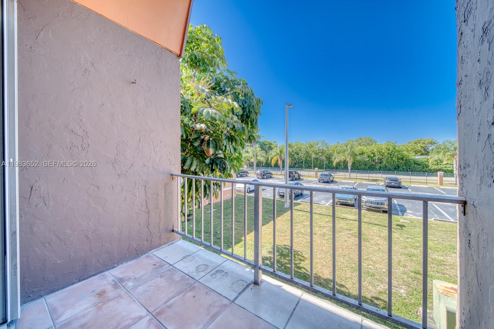 9459 Southwest 76th Street, Unit R5 Miami, FL 33173 - Photo 4 of 33 a view of a swimming pool with a patio