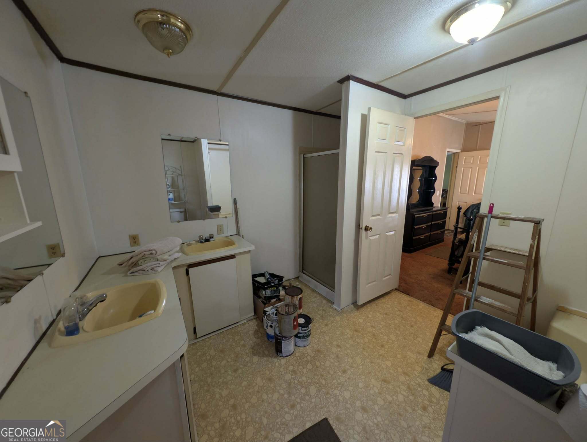 460 Etheridge Mill Road Milner, GA 30257 - Photo 17 of 27 a storage & utility room with a sink