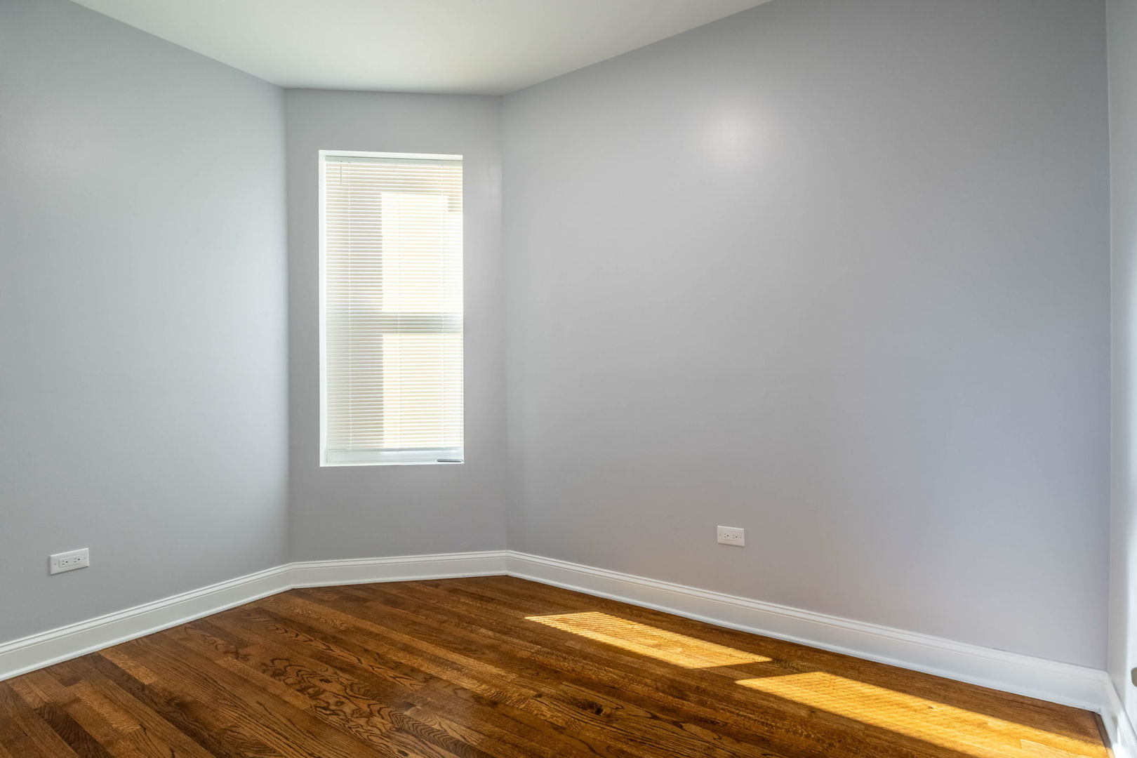4837 West Monroe Street, Unit 1 Chicago, IL 60644 - Photo 9 of 21 a view of an empty room and window
