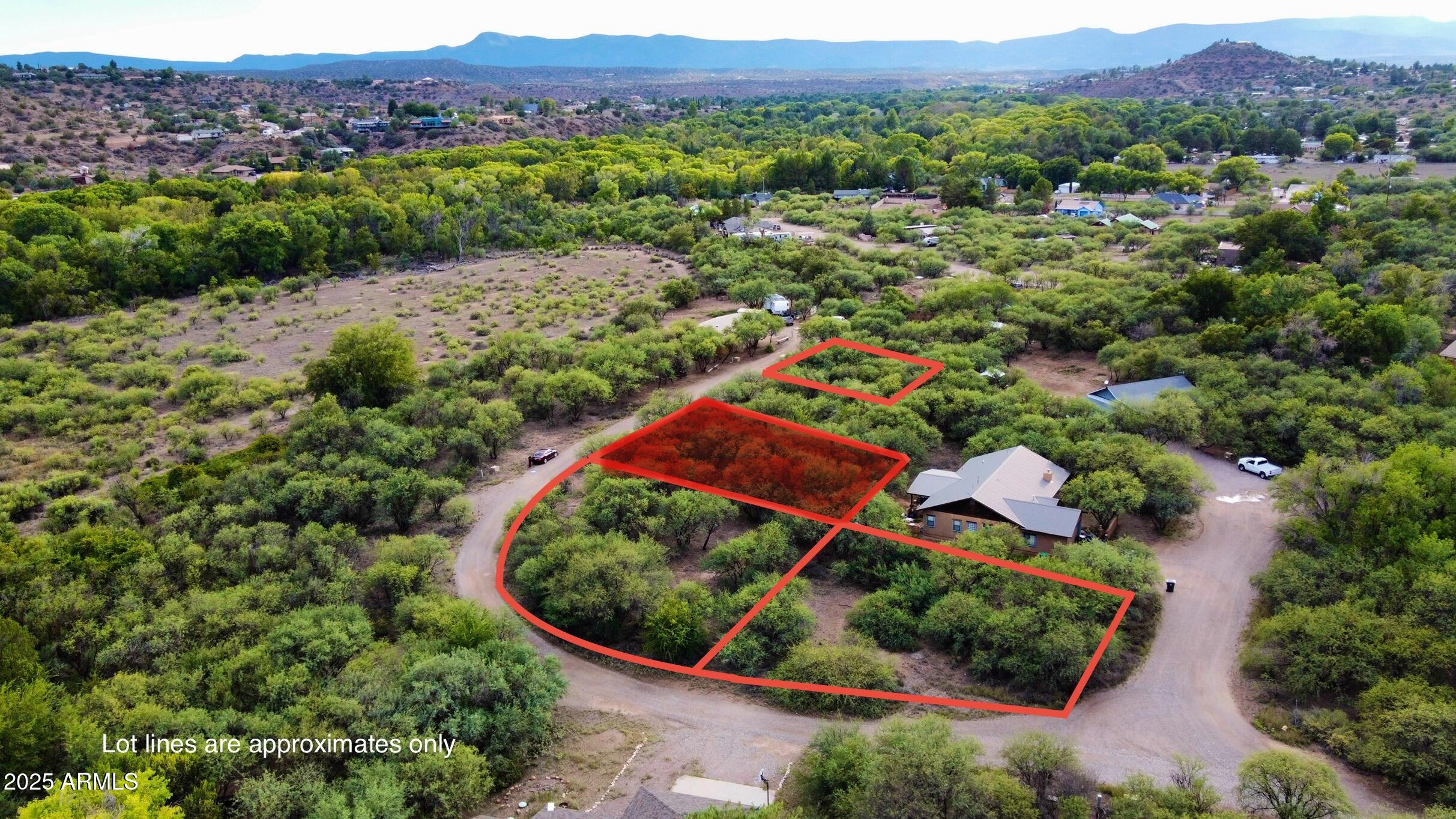 an aerial view of residential house and outdoor space