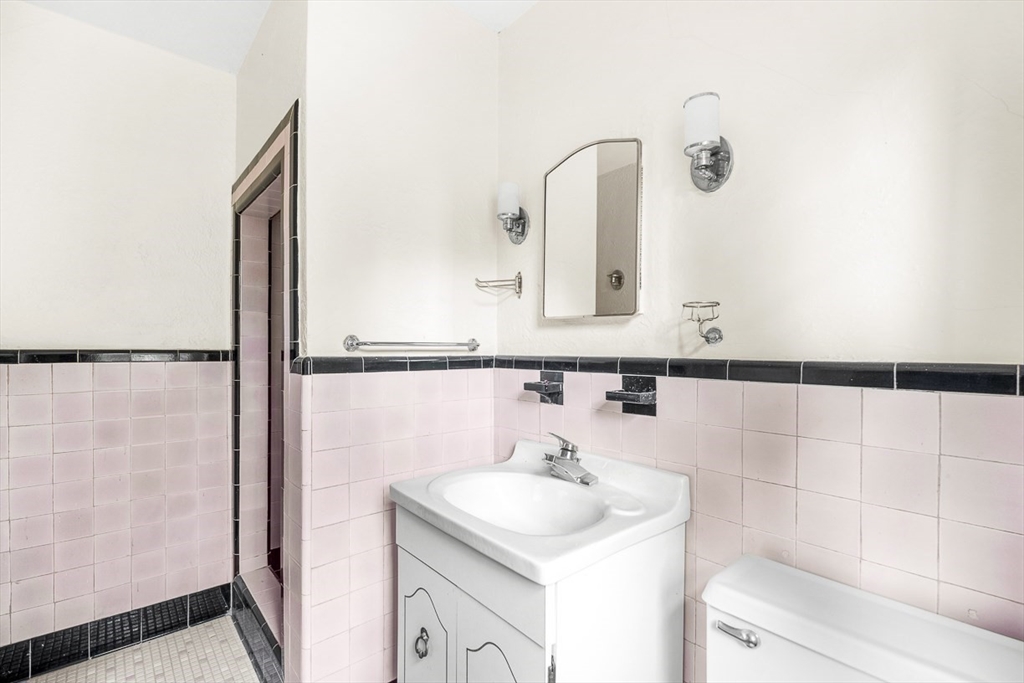 30 Rangeley Road Winchester, MA 01890 - Photo 27 of 42 a bathroom with a sink and a mirror