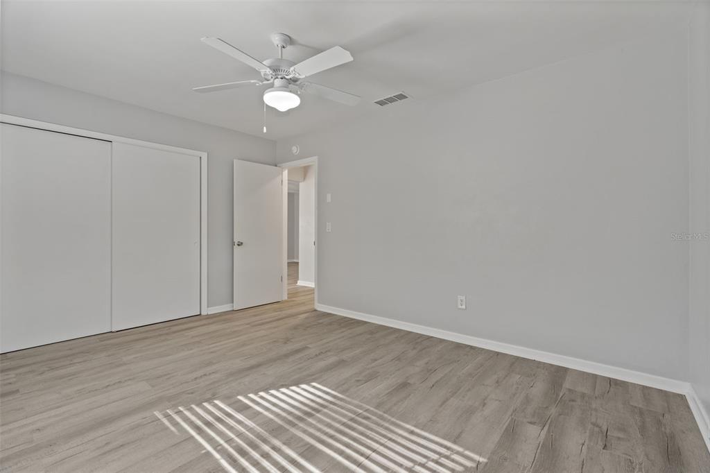 410 Daisy Lane Inverness, FL 34452 - Photo 24 of 37 wooden floor in an empty room