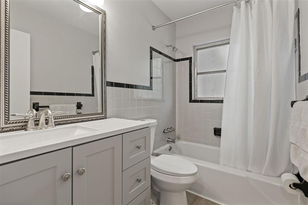 410 Daisy Lane Inverness, FL 34452 - Photo 25 of 37 a bathroom with a sink toilet and shower