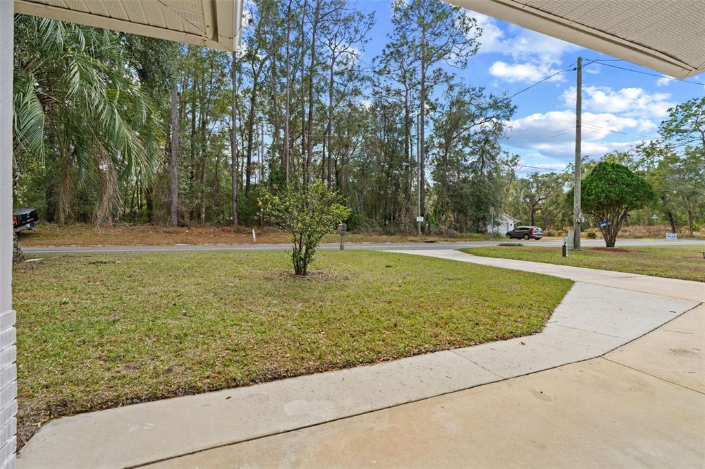 410 Daisy Lane Inverness, FL 34452 - Photo 6 of 37 a view of a park with large trees