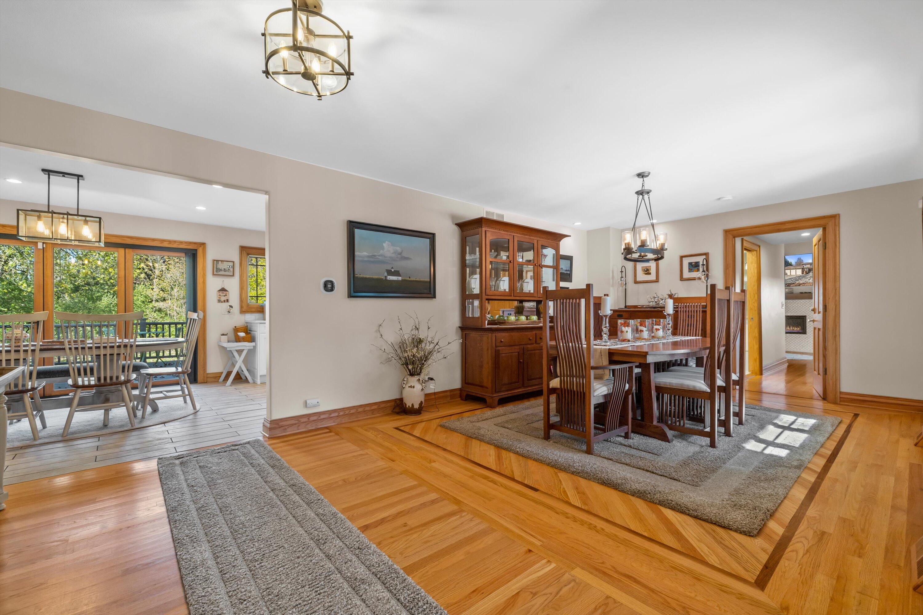 8400 122nd Street Pleasant Prairie, WI 53158 - Photo 25 of 78 Formal Dining with inlaid hardwood floor