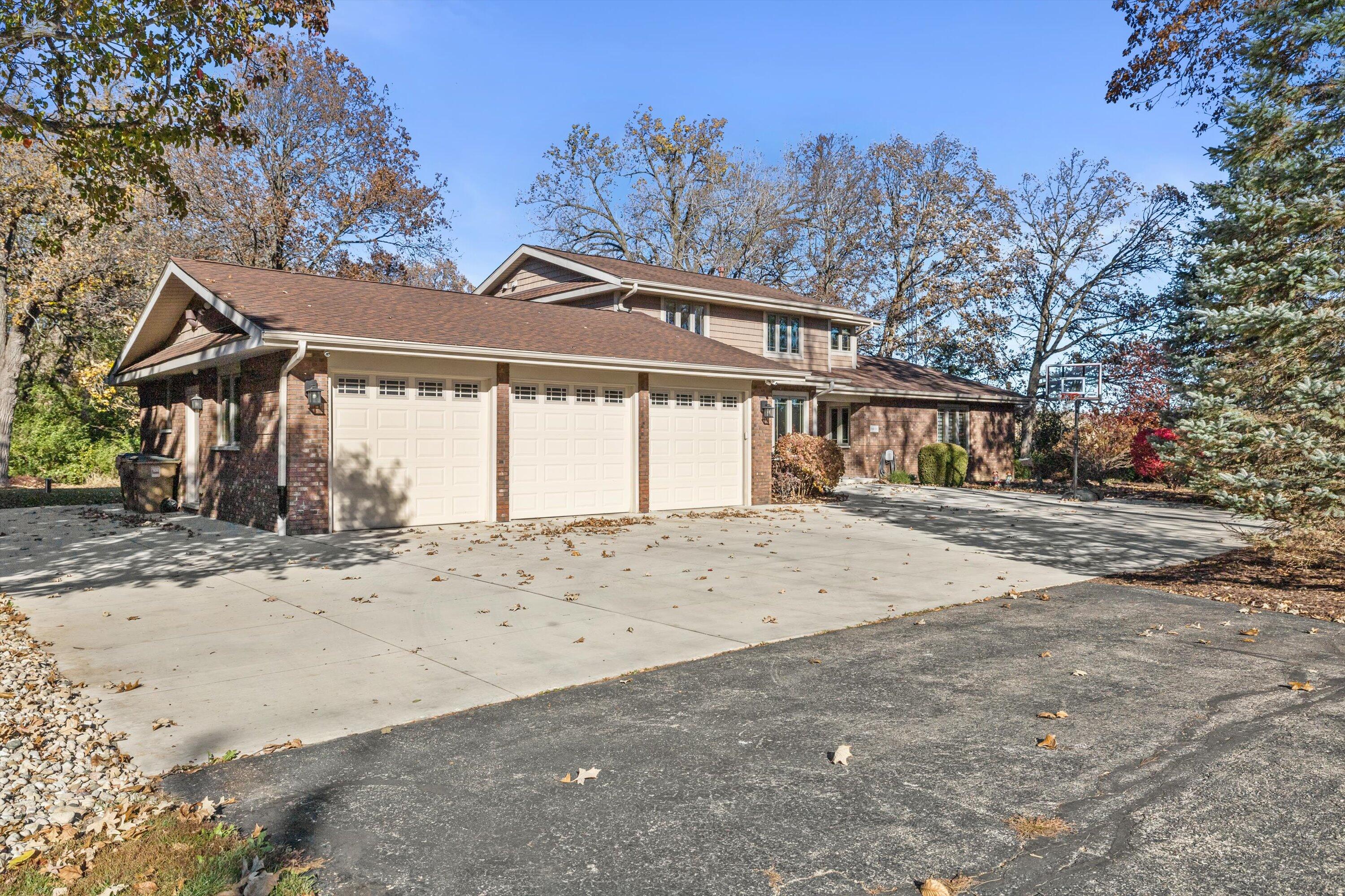 8400 122nd Street Pleasant Prairie, WI 53158 - Photo 55 of 78 Spacious garage plus new driveway