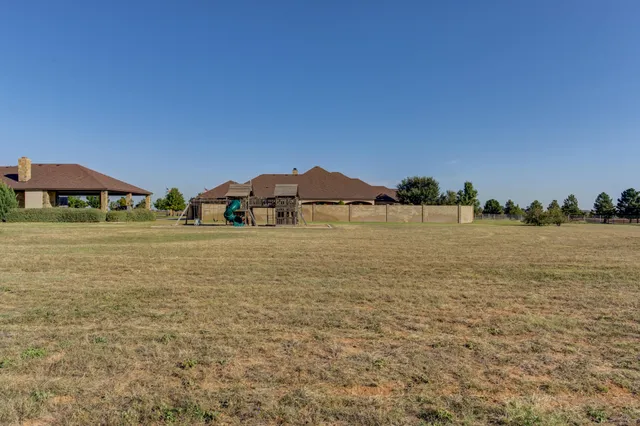 a bedroom with a bed and furniture