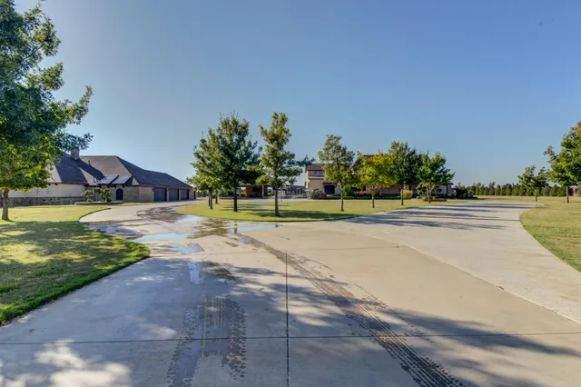 a view of a livingroom with furniture and chandelier