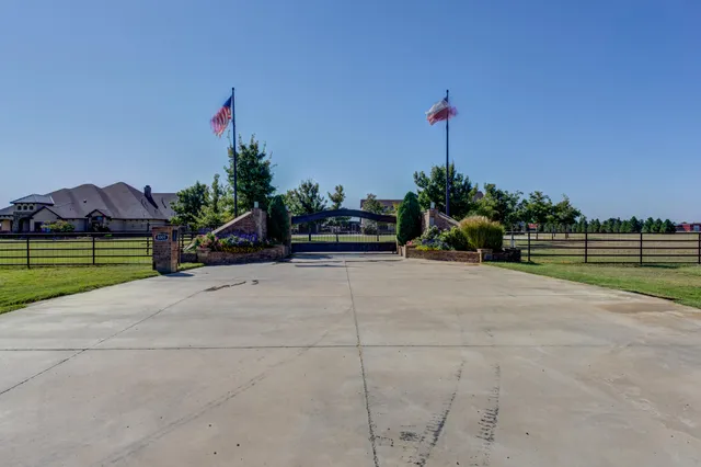 a house view with swimming pool in front of yard