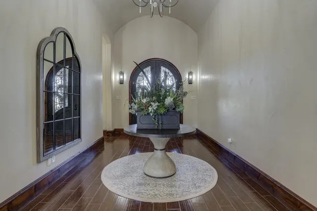 a view of swimming pool with outdoor seating and lake