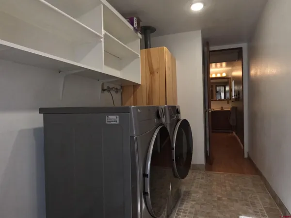 a utility room with closet