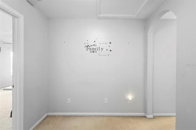 a view of a backyard of a house with a yard