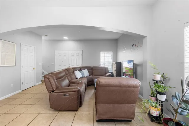 a kitchen with a sink stove top oven and cabinets