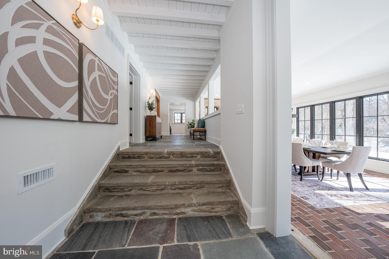 201 South Spring Mill Road Villanova, PA 19085 - Photo 26 of 84 Hall Stairs and Dining Room Entrance