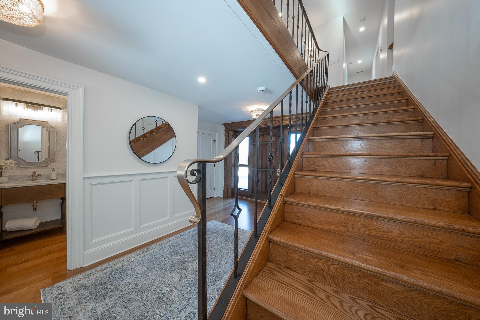 201 South Spring Mill Road Villanova, PA 19085 - Photo 45 of 84 Stairs - original iron spindles & brass hand rail