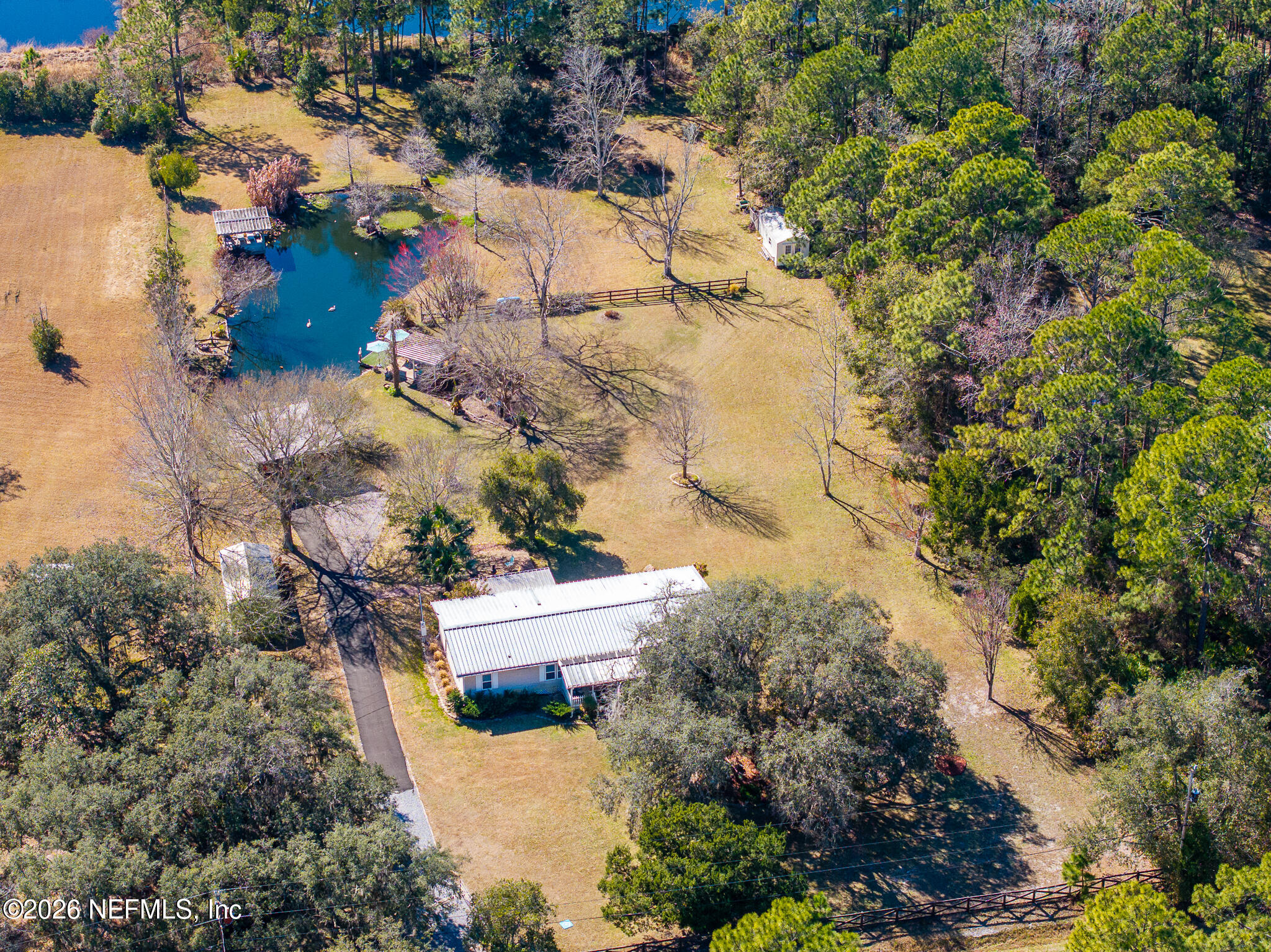 6901 Catlett Road St. Augustine, FL 32095 - Photo 2 of 74 an aerial view of house with yard and swimming pool