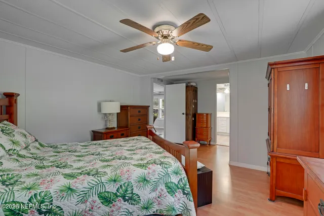 a kitchen with a sink cabinets and window