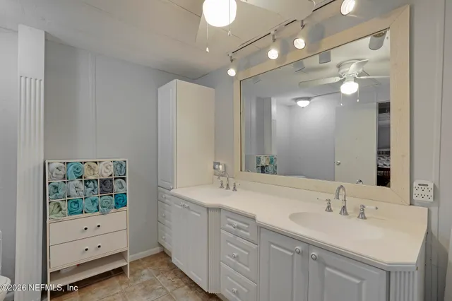 a kitchen with a sink stove and refrigerator