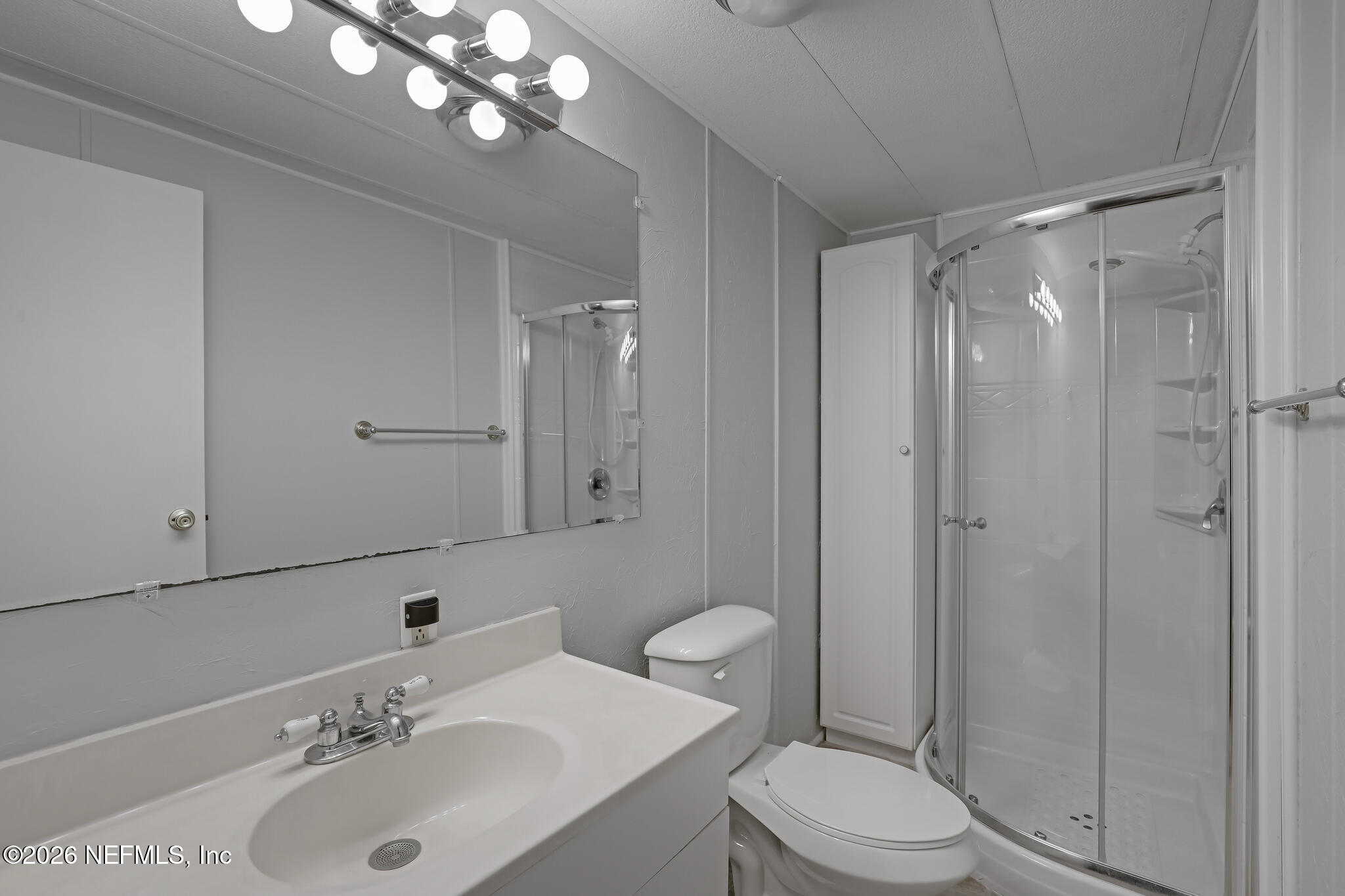 6901 Catlett Road St. Augustine, FL 32095 - Photo 41 of 74 a bathroom with a sink a toilet and shower